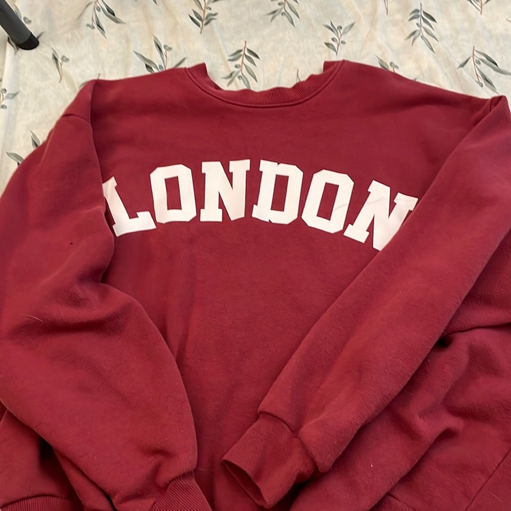 A large pinkish sweatshirt!